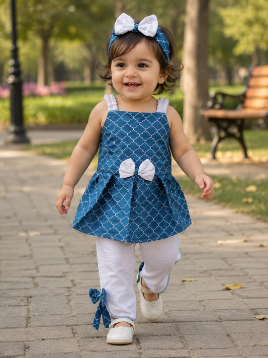 Blue Frock With  White trouser and same  band